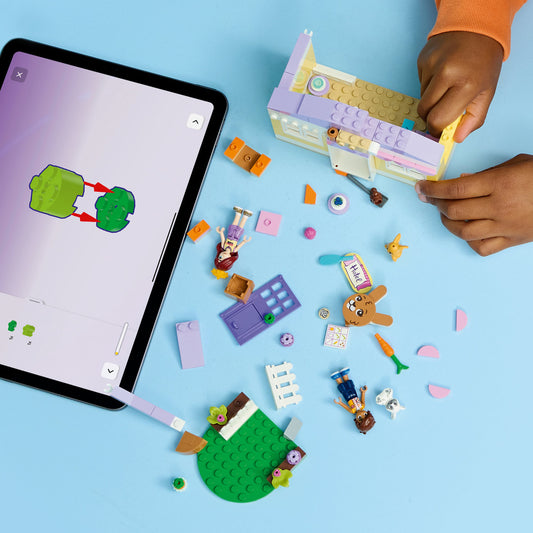 child building lego bunny hotel