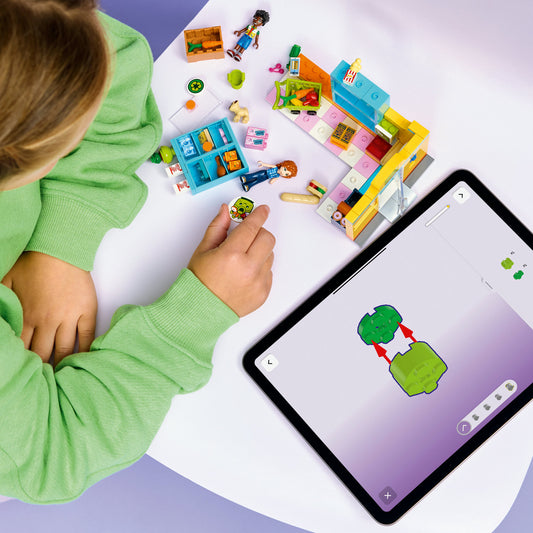 girl building lego friends heartlake city convenience store