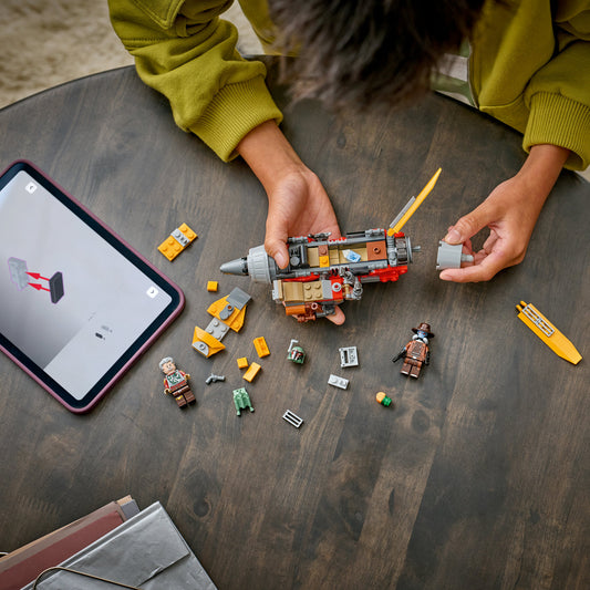 boy building lego star wars cobb vanths speeder