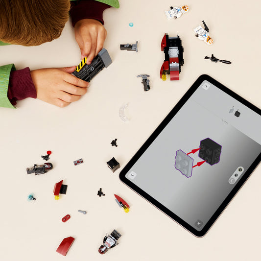 boy building lego star wars siege of madalore battle pack