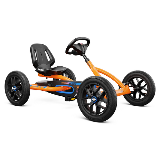 Orange and black pedal go-kart on a white background