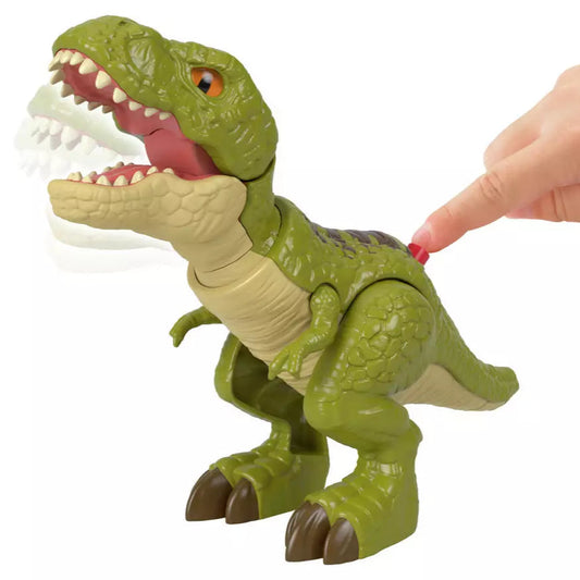 green t-rex toy with hand pressing button on its back to make its mouth open on white background