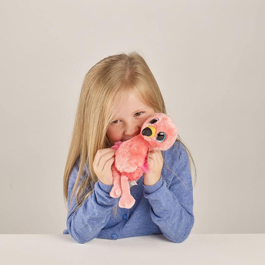 girl holding pink flamingo