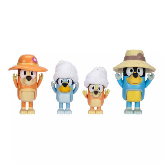 Four dog mini figures on white background