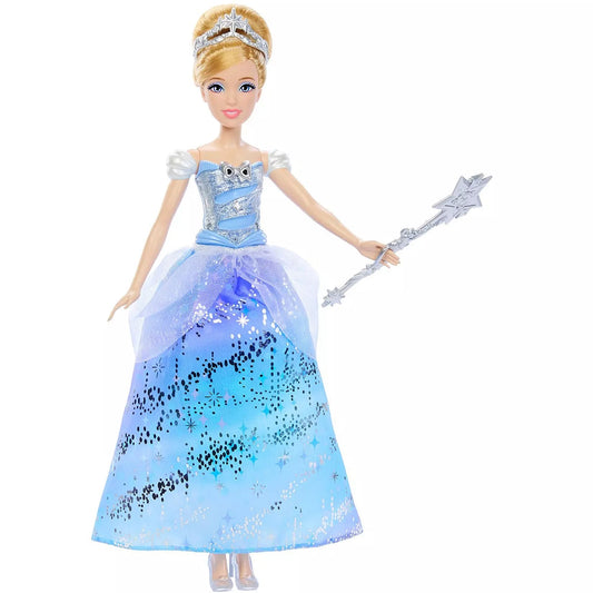 doll in blue dress with wand on white background