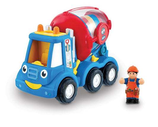 toy cement mixer and figurine on white background