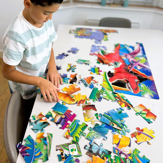 child making dinosaur puzzle