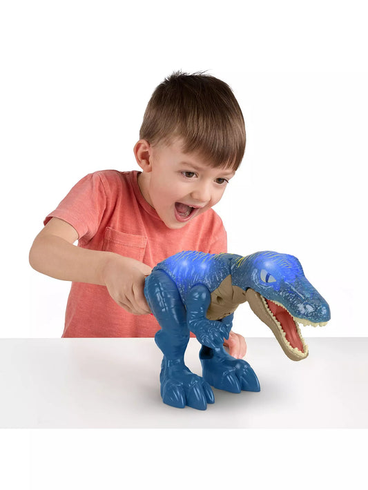 boy playing with blue dinosaur