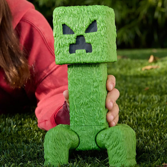 hand holding minecraft creeper