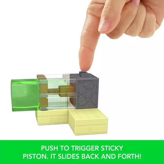 push to trigger sticky piston feature of playset