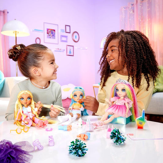 girls playing with fashion dolls