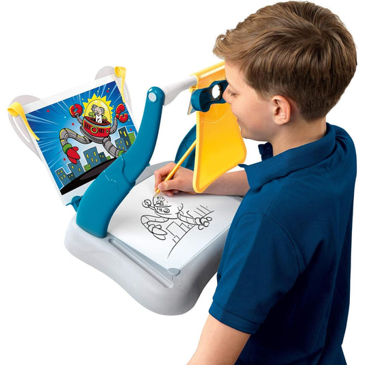 boy drawing with supergraph drawing kit