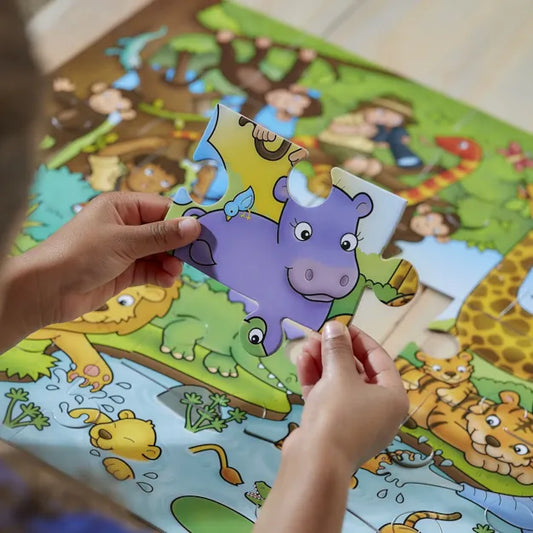 child doing who's in the jungle jigsaw puzzle