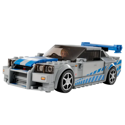 Kids building and playing with the LEGO Speed Champions car set.
