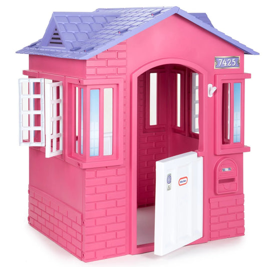 Little Tikes Cape Cottage Pink playhouse with working doors and windows.
