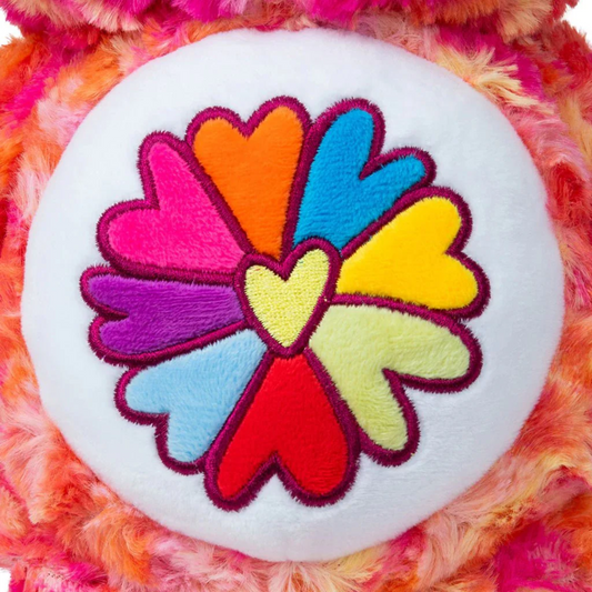 close up of the flower symbol on flower power care bear