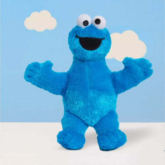 Sesame Street Cookie Monster Plush with clouds background