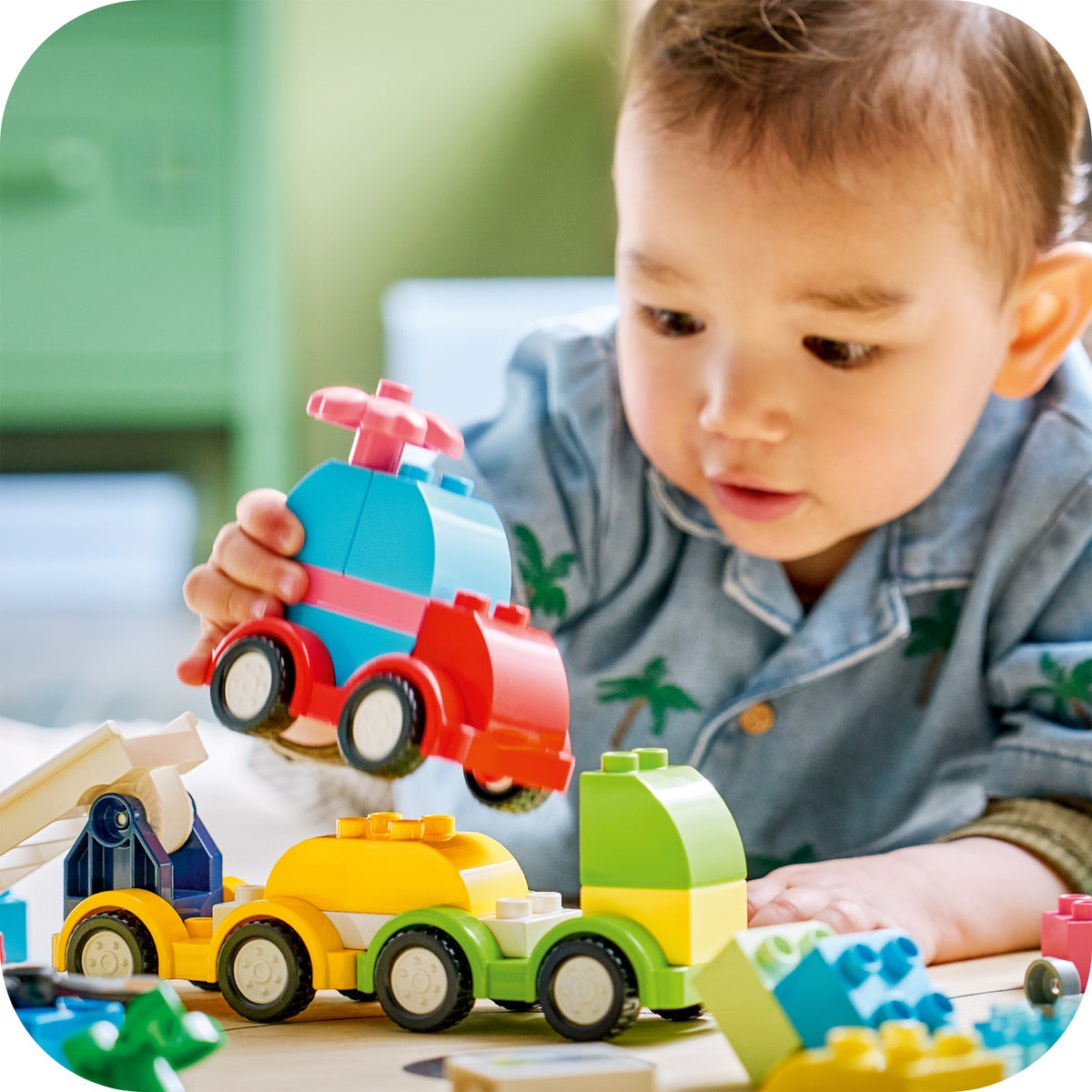 child playing with lego duplo creative vehicles 