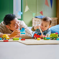 parents and child playing with lego duplo creative vehicles 