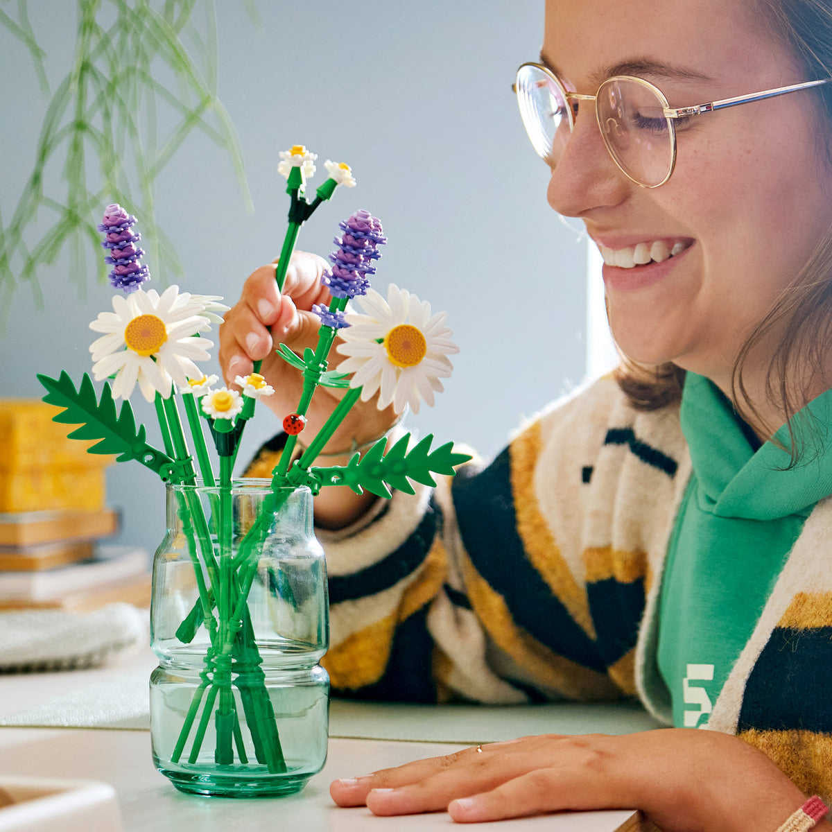 girl playing with lego daisies 