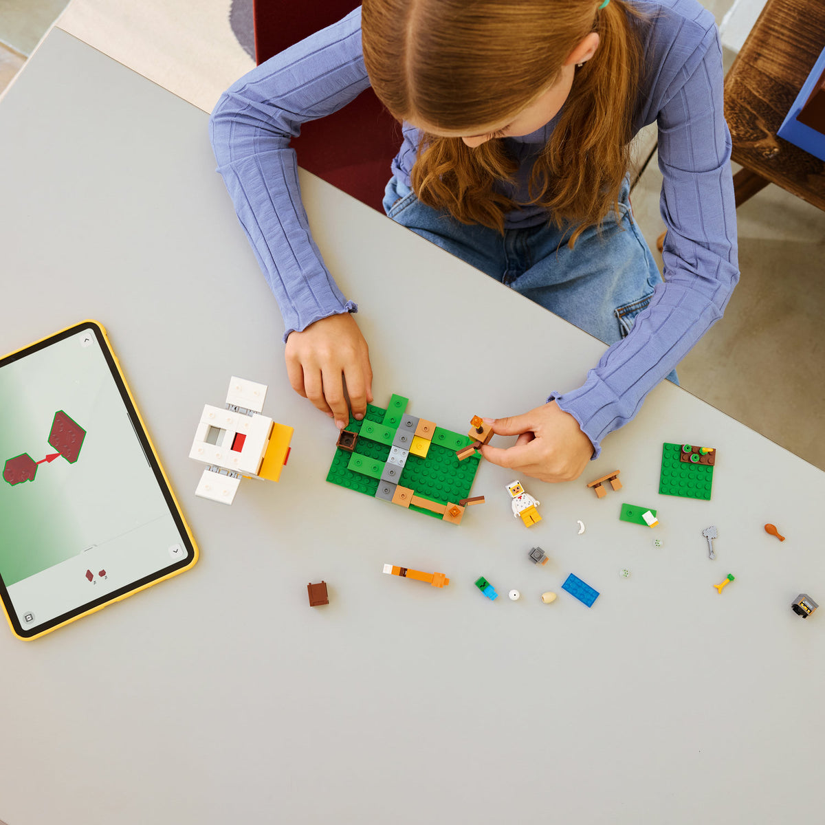 girl building lego minecraft chicken farm 