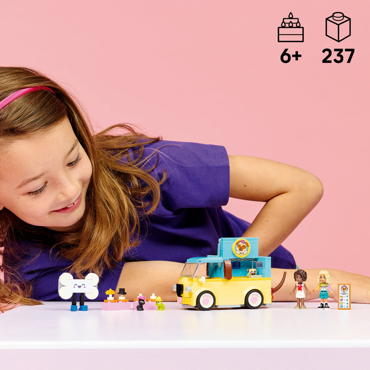 girl playing with pet accessories van lego set 