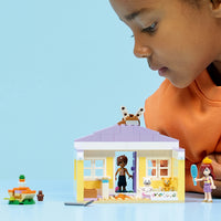child playing with lego bunny hotel 