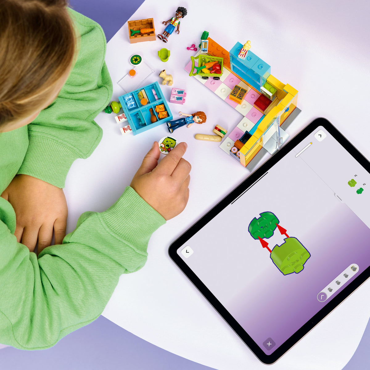 girl building lego friends heartlake city convenience store