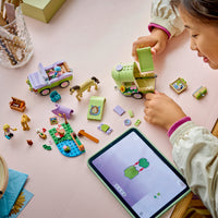 girl building lego friends horse and baby foal trailer 