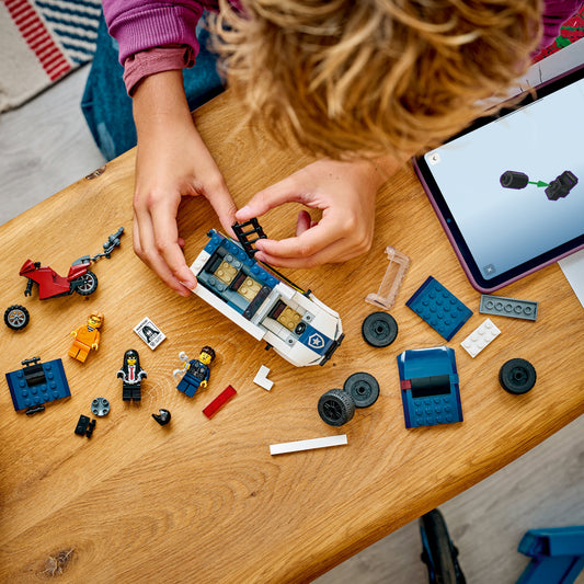 boy building lego city police prisoner transport van 