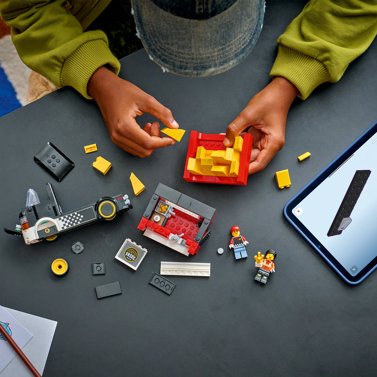 boy building lego city fries food truck 