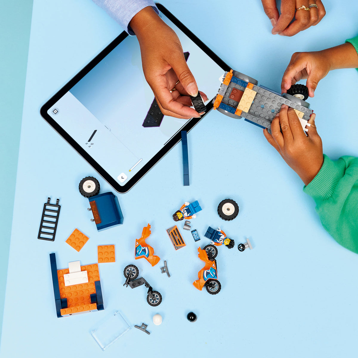 boy building motorcycle transport set 