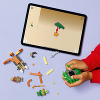 boy building lego lloyd vs earth monster spinner