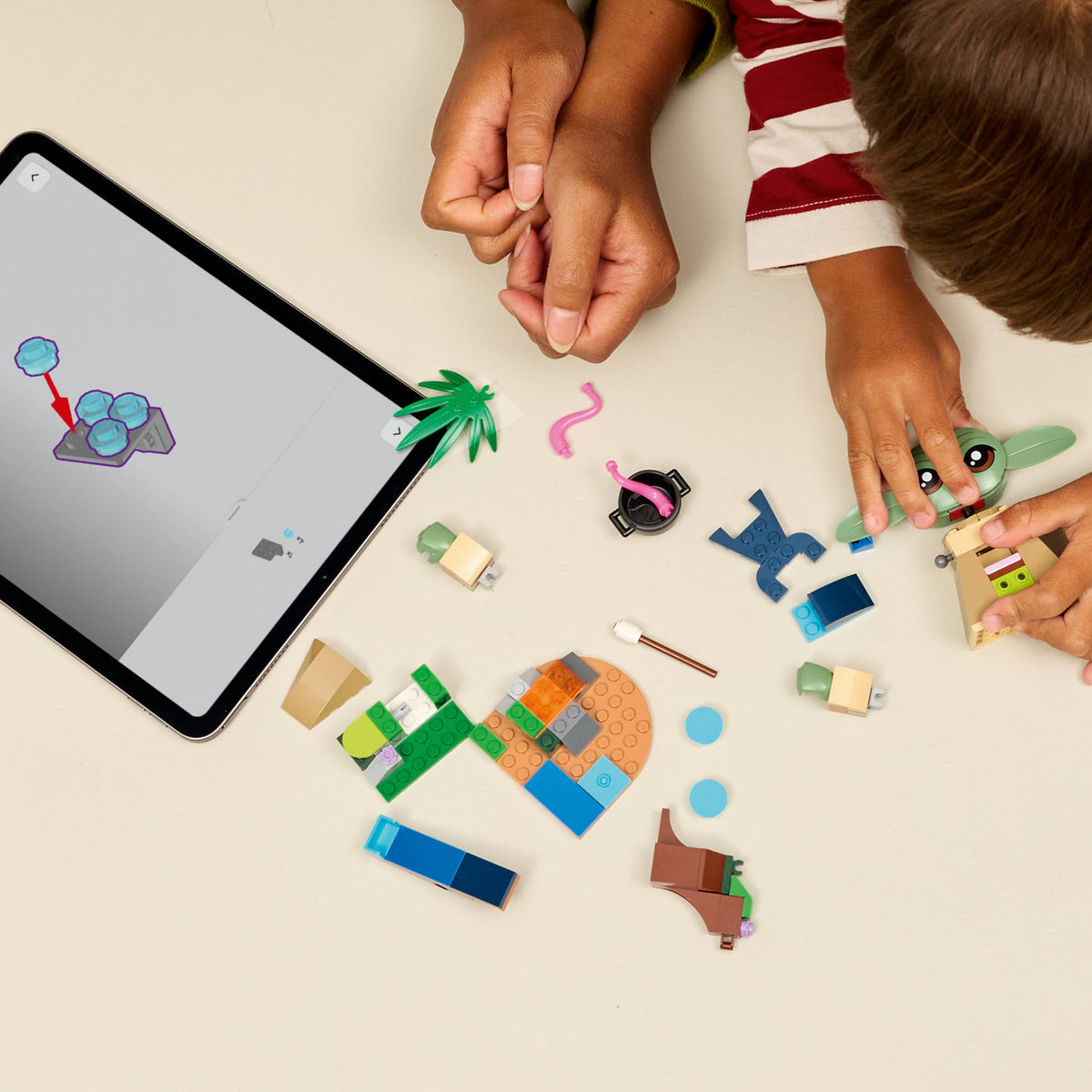 boy building grogus homestead lego set 