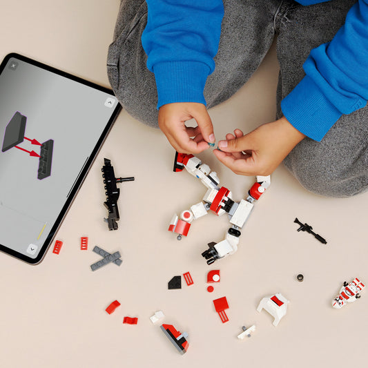 boy building lego star wars clone shock trooper mech