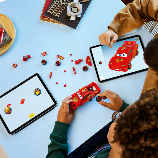 boys building lego lightning mcqueen