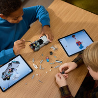 boys building lego time machine from back to the future 