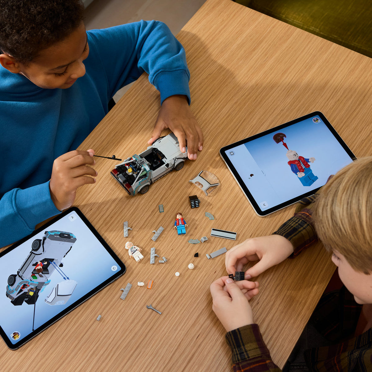boys building lego time machine from back to the future 