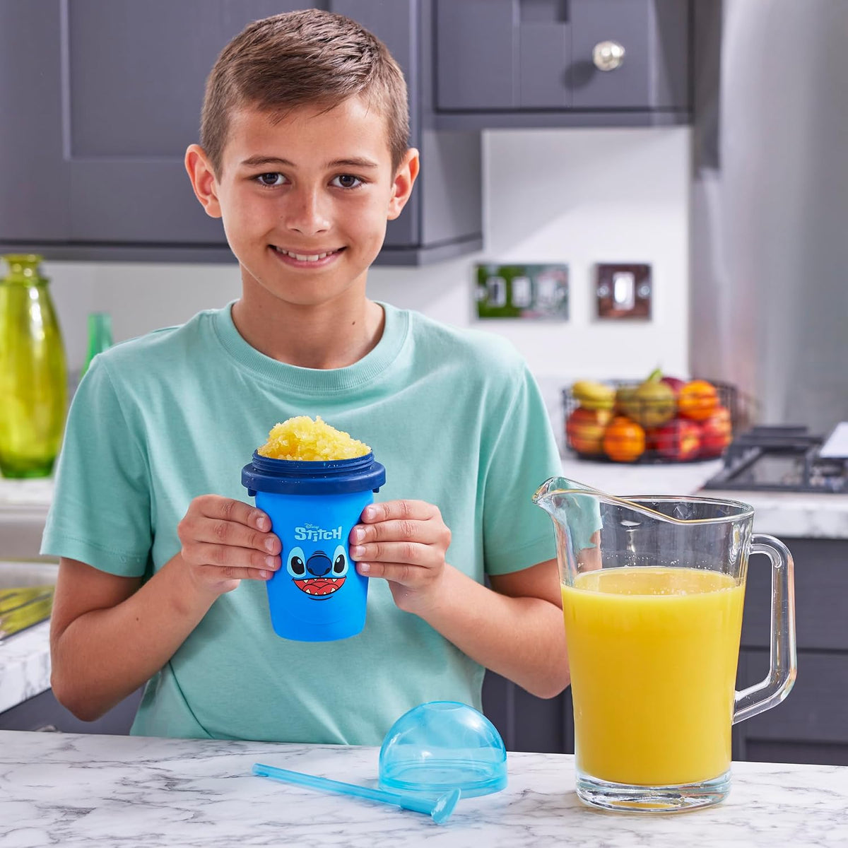 ChillFactor Disney Stitch Slushy Maker Blue – child holding the slushy maker