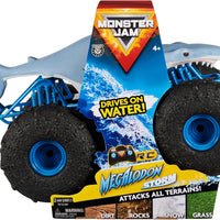 Toy monster truck with shark design and 'Monster Jam' branding on packaging