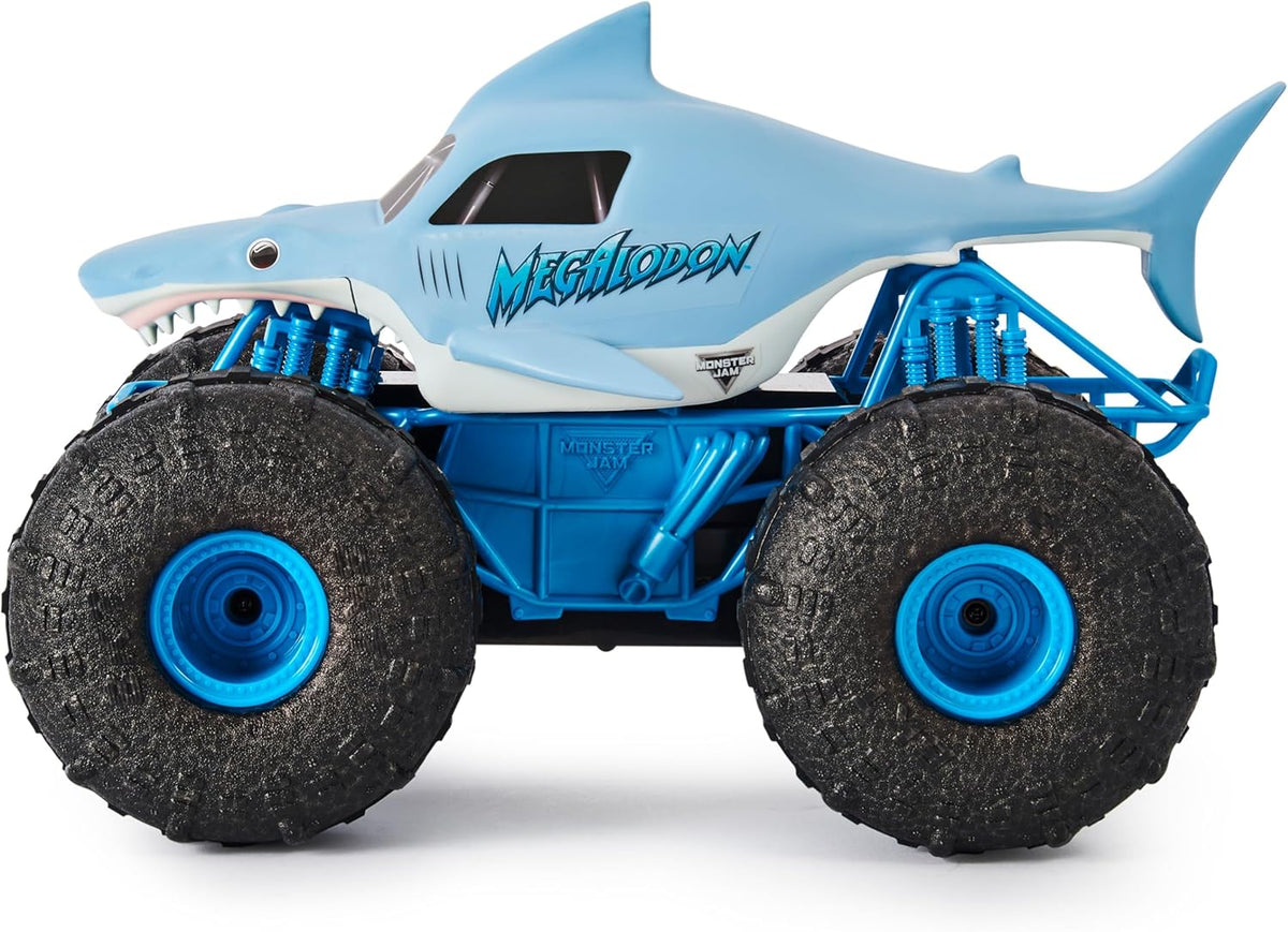 Toy monster truck with shark design on a white background