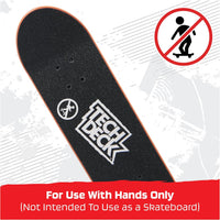 Tech Deck skateboard deck with a warning label on a white background
