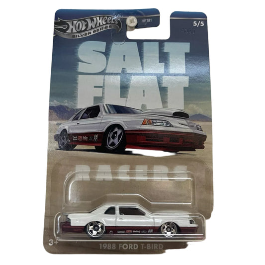 Hot Wheels die-cast 1988 Ford T-Bird model, 2025 Salt Flat Racers series with a dynamic white/red finish.
