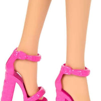 Barbie Fashionistas Doll #223 brings fun accessories, a blonde wavy hairdo, and a vibrant Totally Hair-inspired dress for playtime fun.
