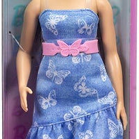 Barbie Fashionistas Doll #231, a stylish doll with purple hair and a trendy denim dress, pink belt, and boots.
