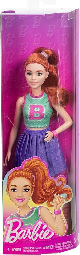 Barbie Fashionistas Doll #232 features red hair, a fun sporty top, and a stylish purple skirt with sneakers and a watch.
