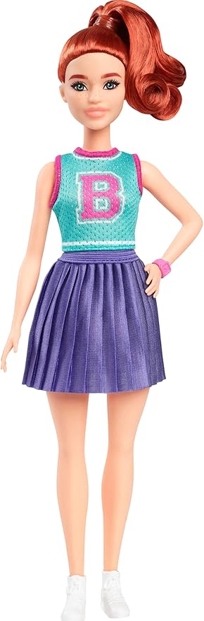 Barbie Fashionistas Doll #232 with red hair, wearing a sporty "B" jersey top, pleated purple skirt, and sneakers.
