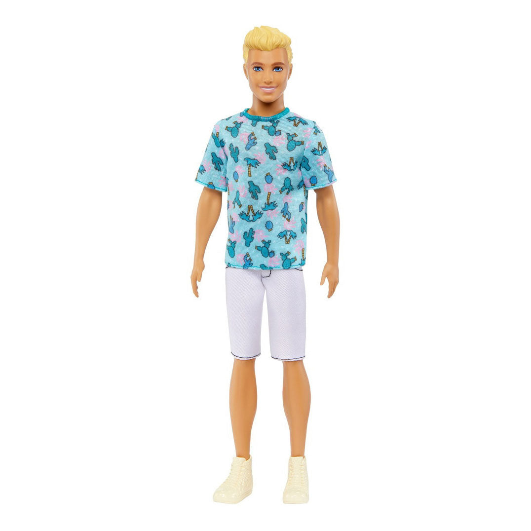 The Ken #211 doll features a tropical cactus design shirt and casual white shorts for a relaxed yet stylish look.
