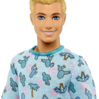 This Ken #211 doll is sporting a casual yet fashionable cactus and palm tree print tee with white shorts and sneakers.
