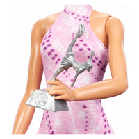Barbie Figure Skater Fashion Doll in a dynamic skating pose, inspiring young ice skaters.
